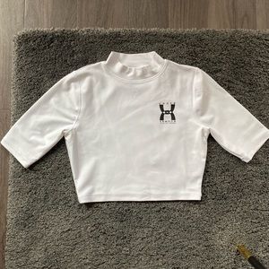 Under Armour 25th anniversary crop top, size Medium, white